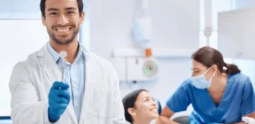 man-dentist-toothbrush-hygiene-clinic-600nw-2475778291 man-dentist-toothbrush-hygiene-clinic-600nw-2475778291